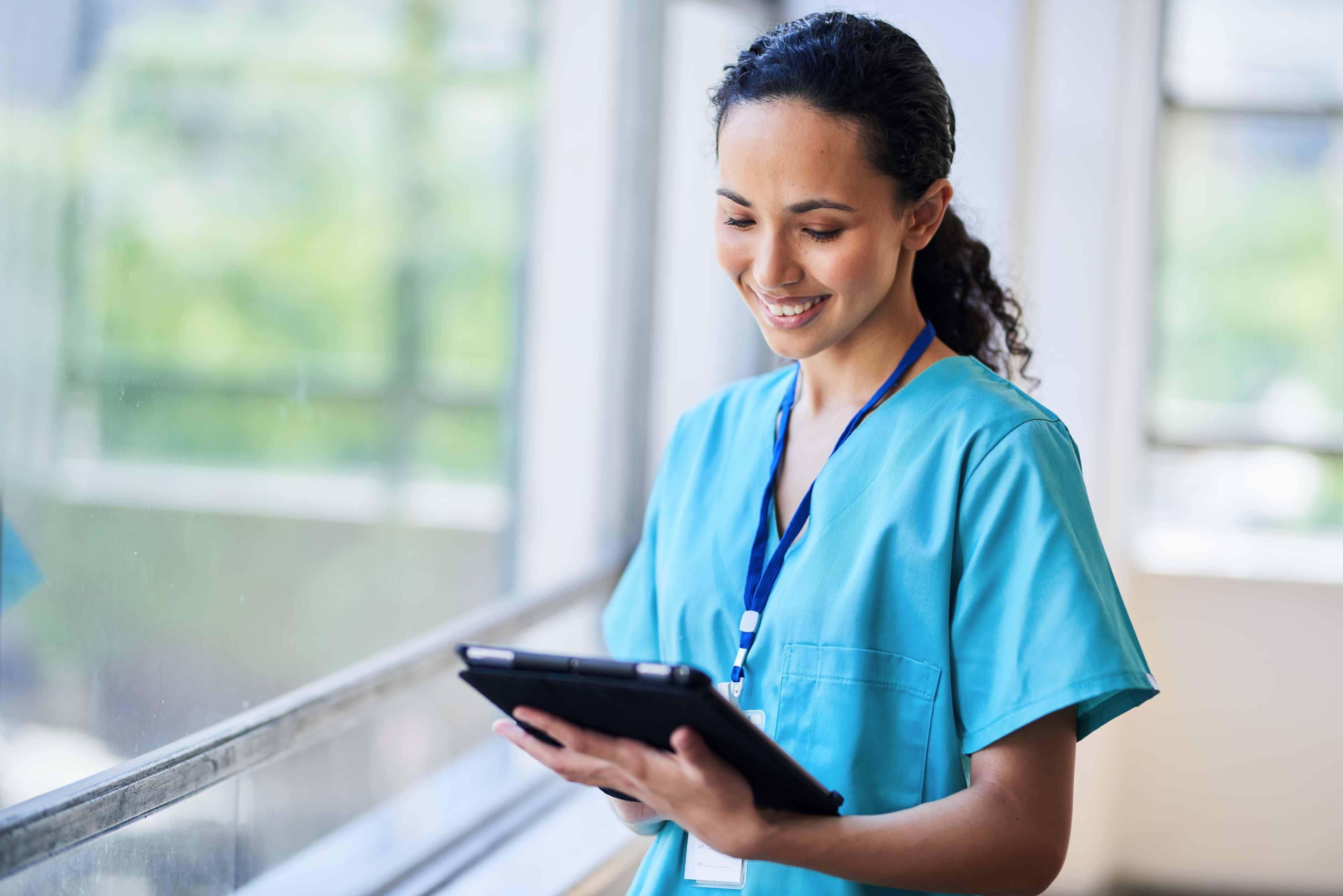 Healthcare professional using digital tablet